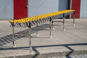 Roller conveyor, stretchable, rotary roller conveyor
