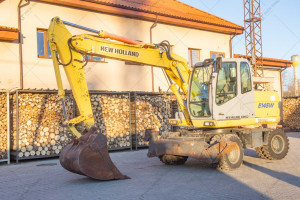 Колісний екскаватор New Holland E145D 2003 р. 