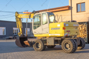 Колісний екскаватор New Holland E145D 2003 р. 