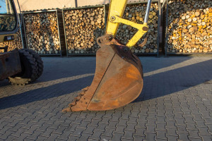 Колісний екскаватор New Holland E145D 2003 р. 