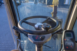 Колісний екскаватор New Holland E145D 2003 р. 